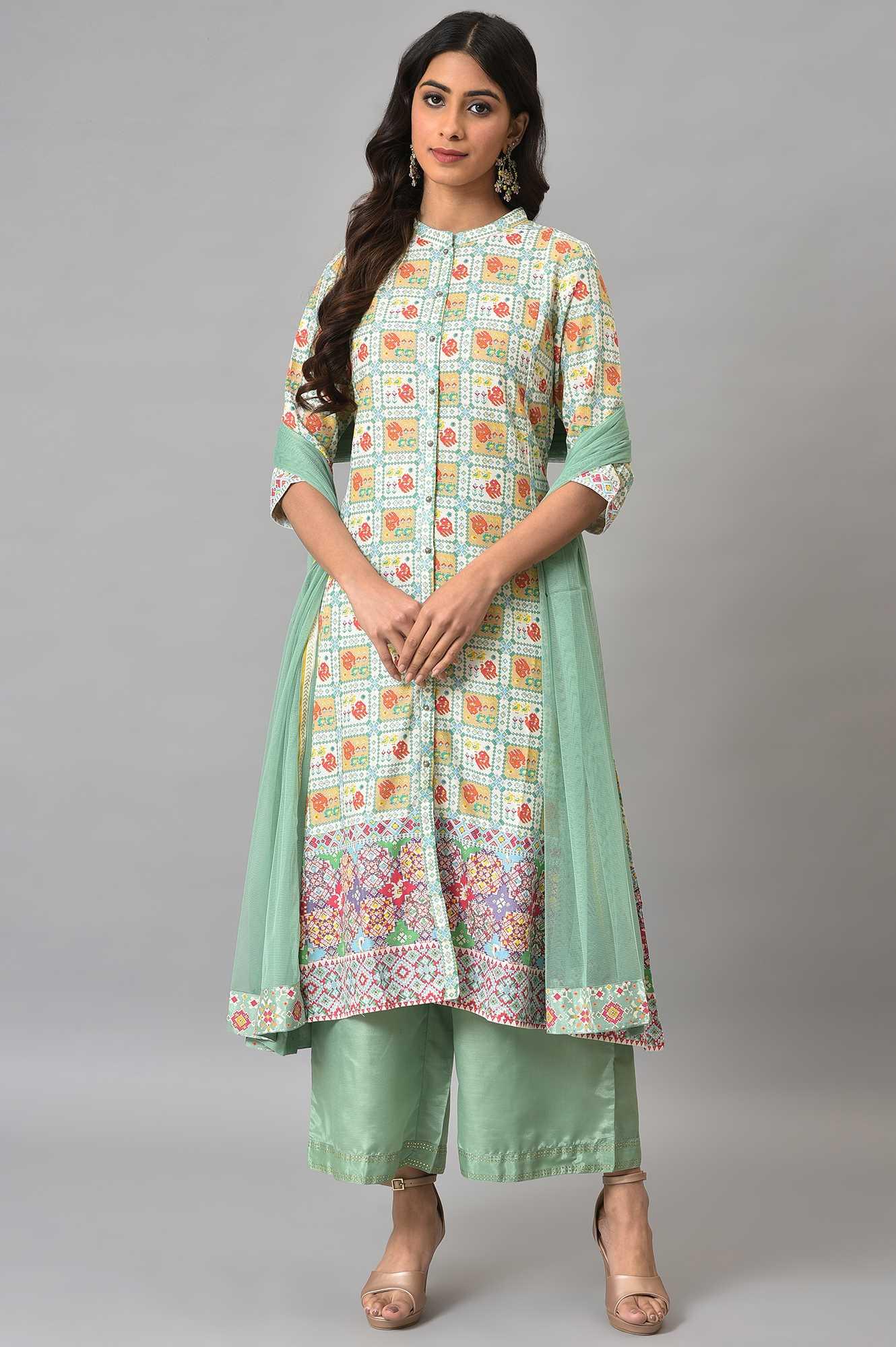 Ecru And Multicoloured Printed Flared kurta With Green Parallel Pants And Mesh Dupatta