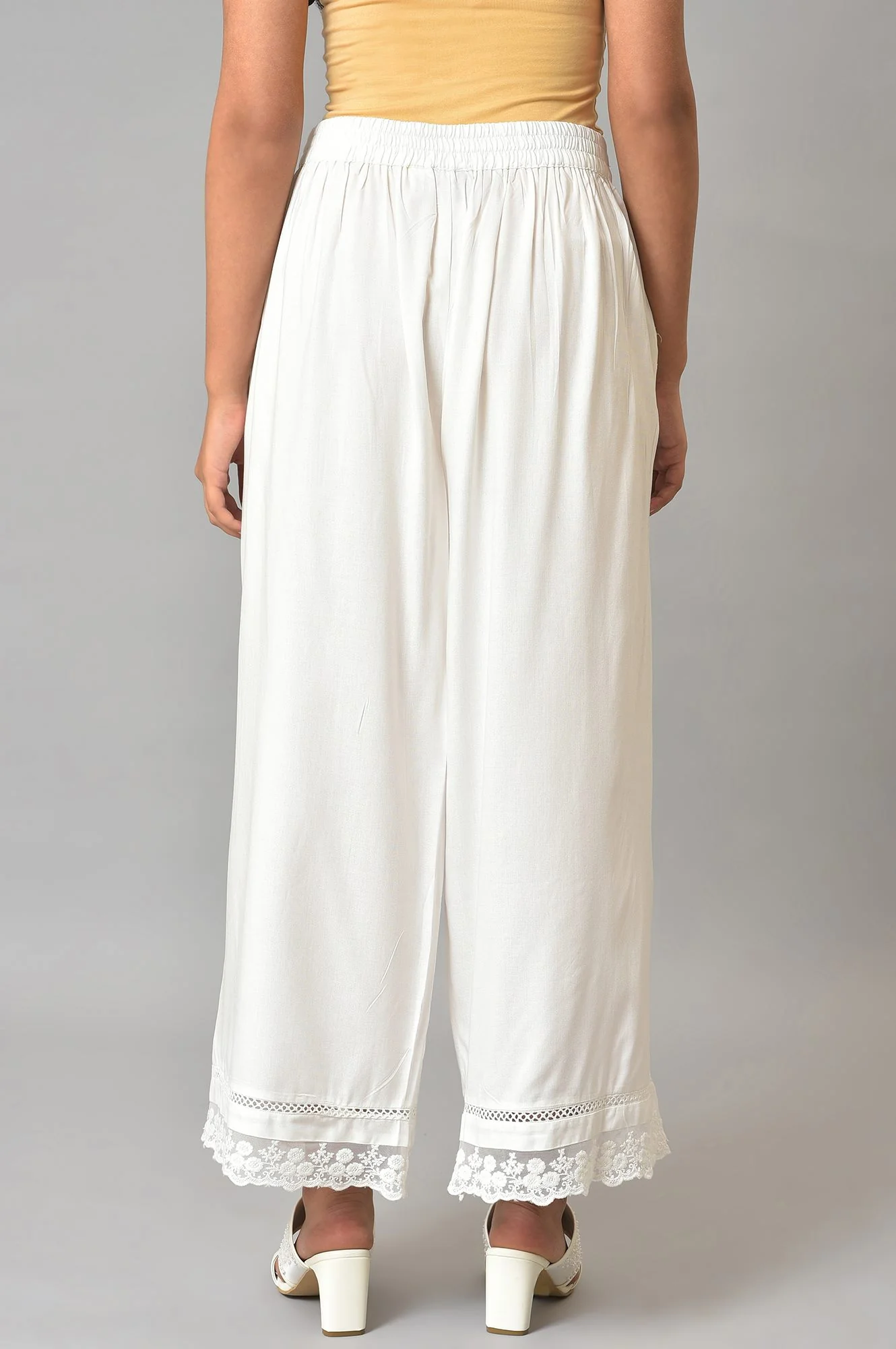Ecru Parallel Pants With Lace At Hemline - Image 2