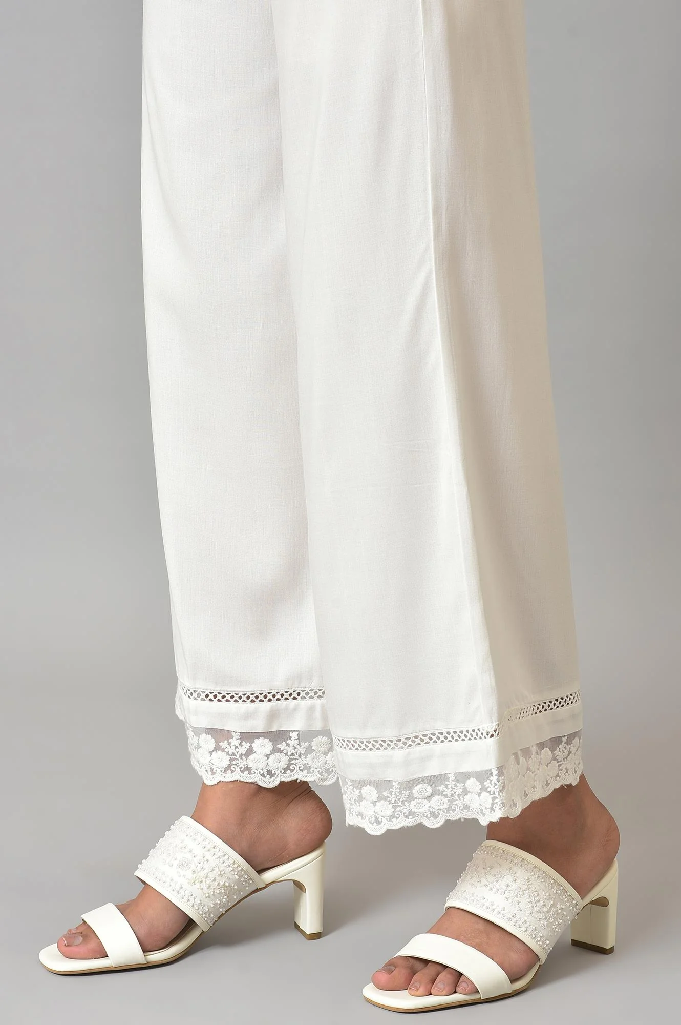 Ecru Parallel Pants With Lace At Hemline - Image 8
