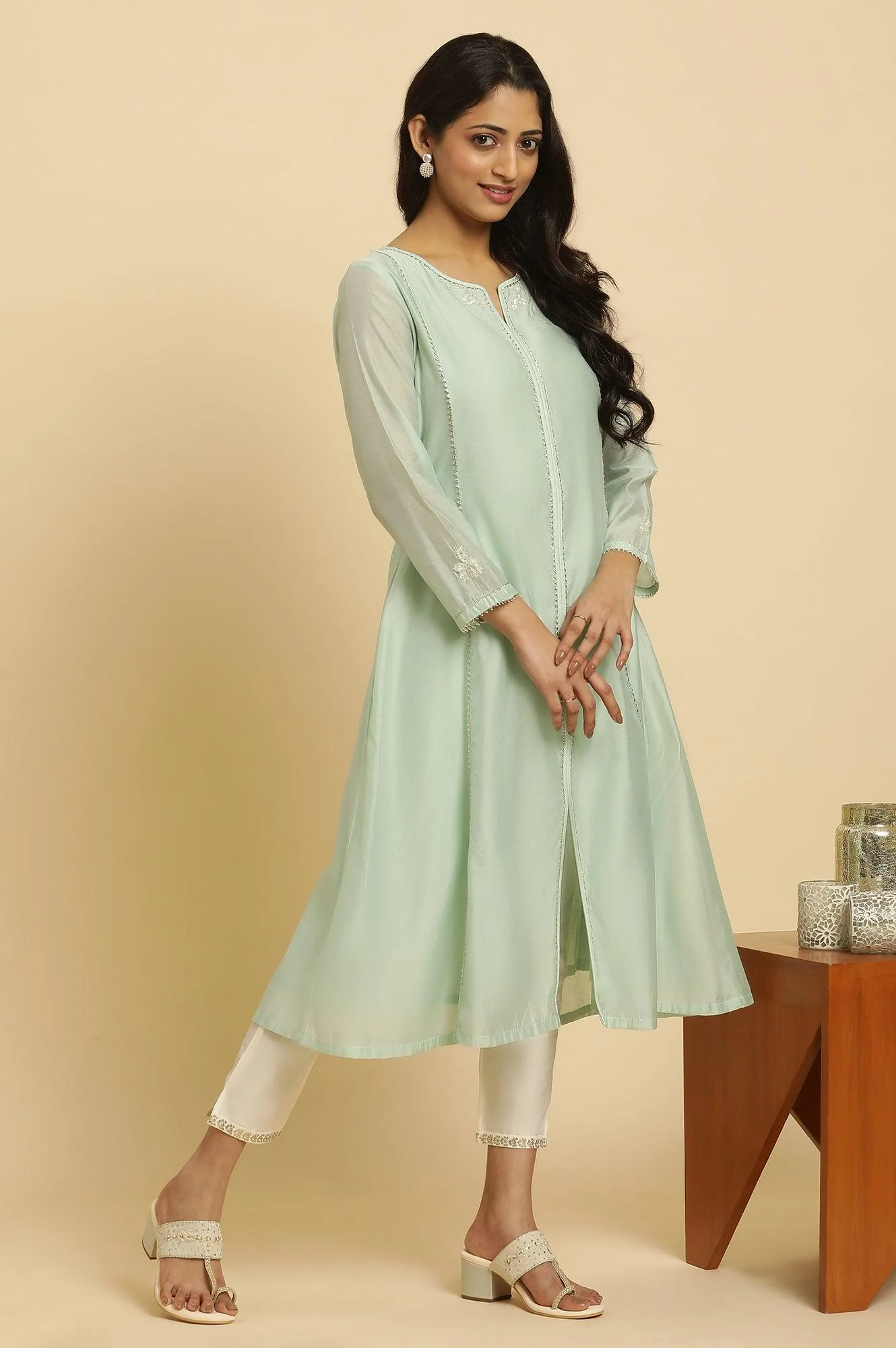 Ecru Slim Pants With Embroidered Hemline - Image 5