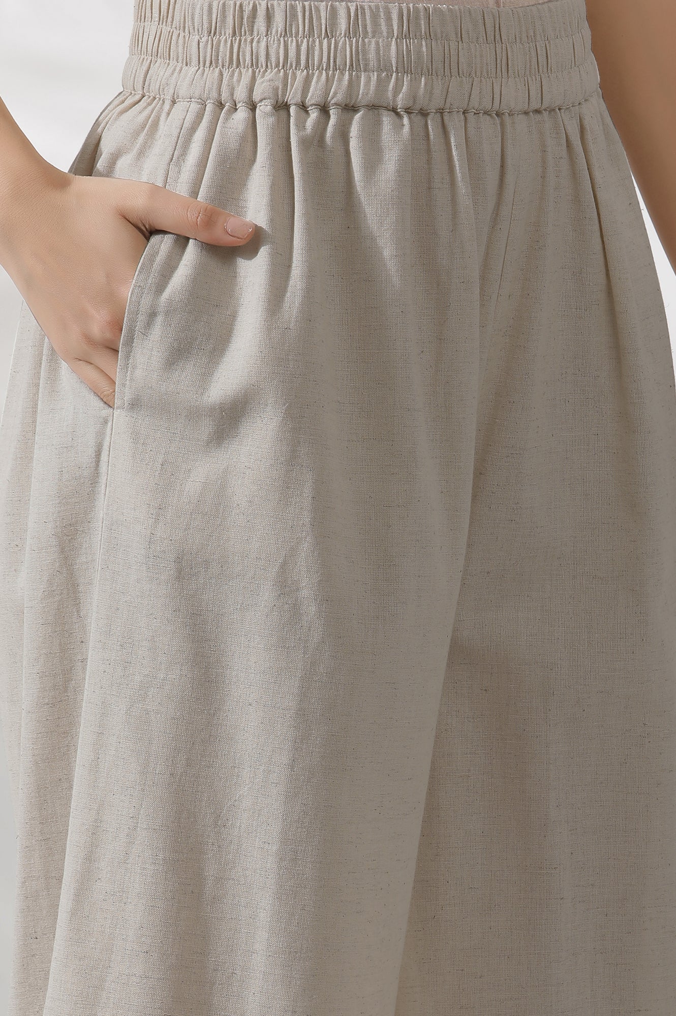 Light Beige Sleeveless Schiffli Kurta And Flared Pants Set - Image 10