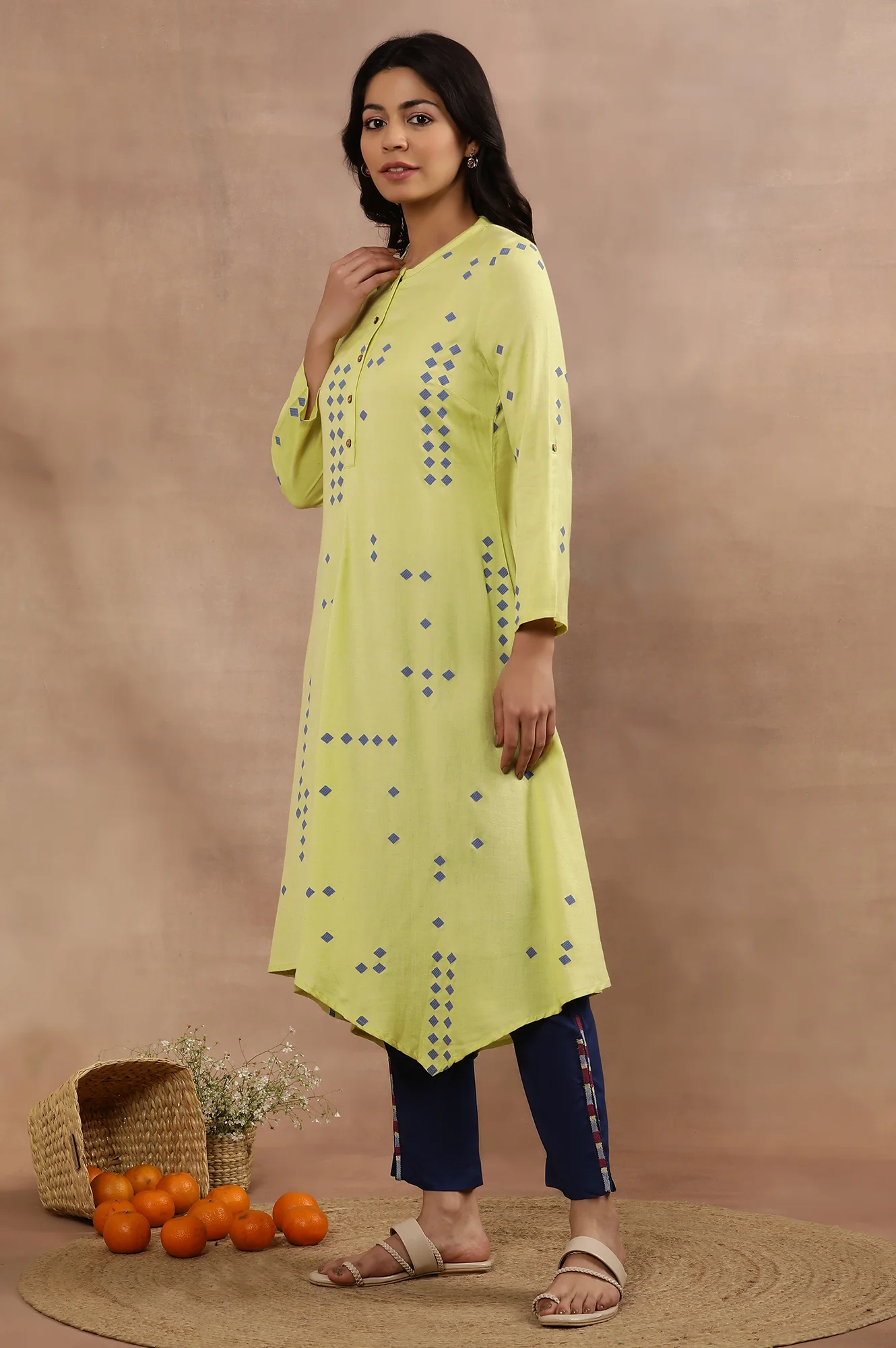 Green Printed Asymmetrical Kurta And Blue Slim Pants Set - Image 4