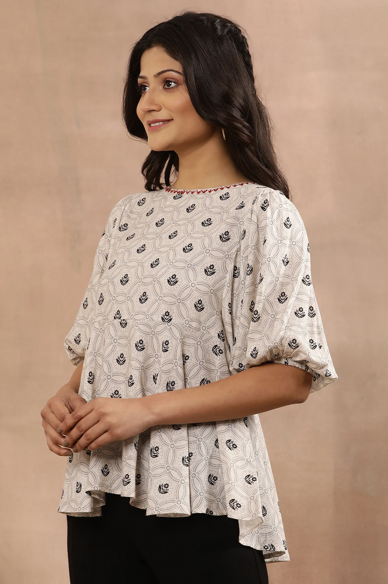 Off-White Printed Peplum Top - Image 2