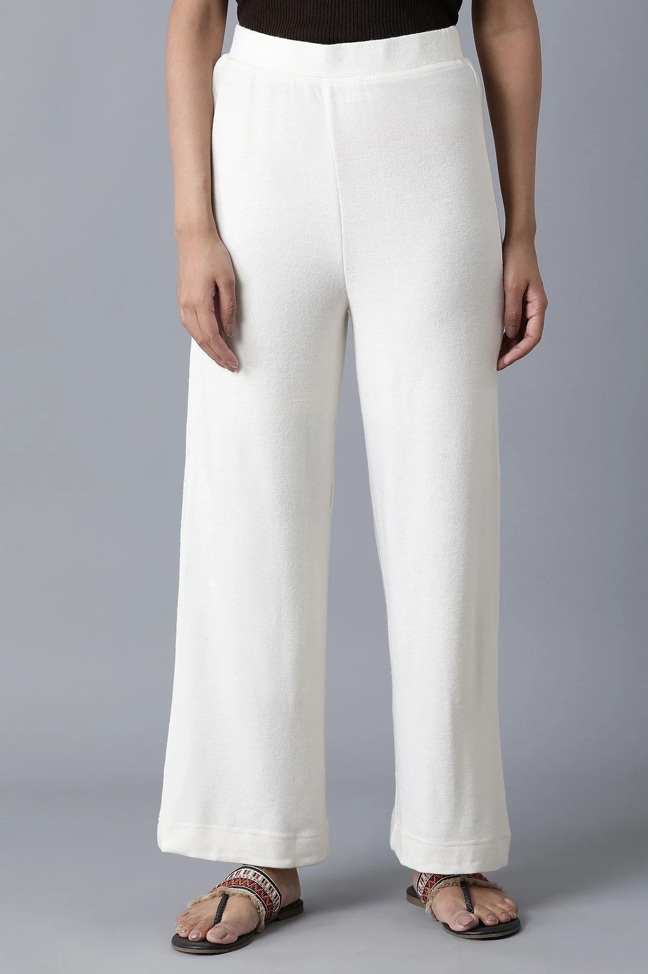 Elleven Women's White Solid Straight Fit Palazzo With Elasticated Waistband