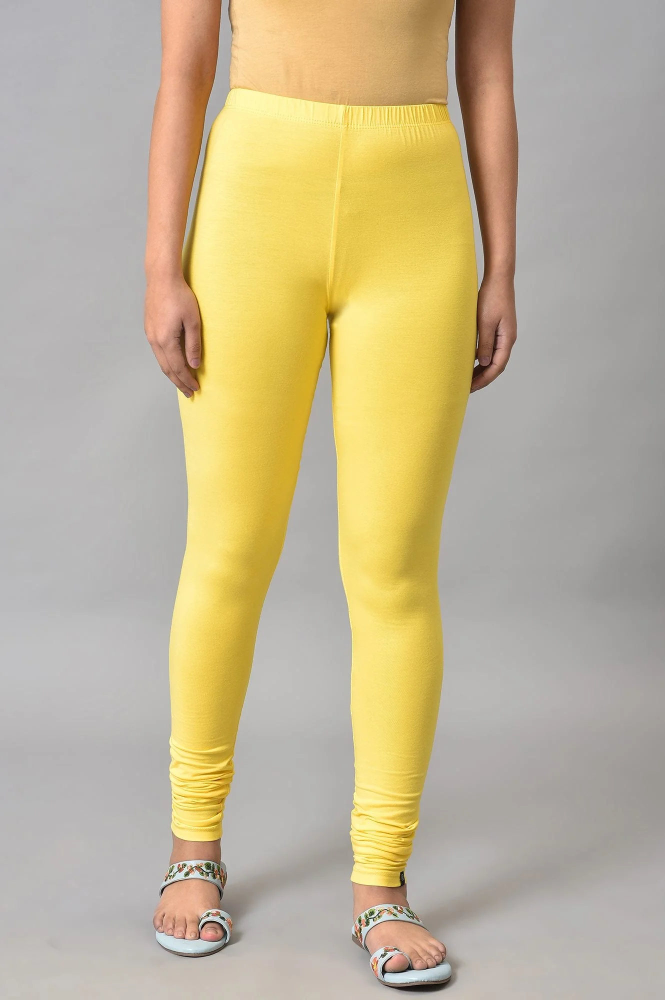 Elleven Women's Yellow Solid Skinny Fit Cotton High Waisted Churidar